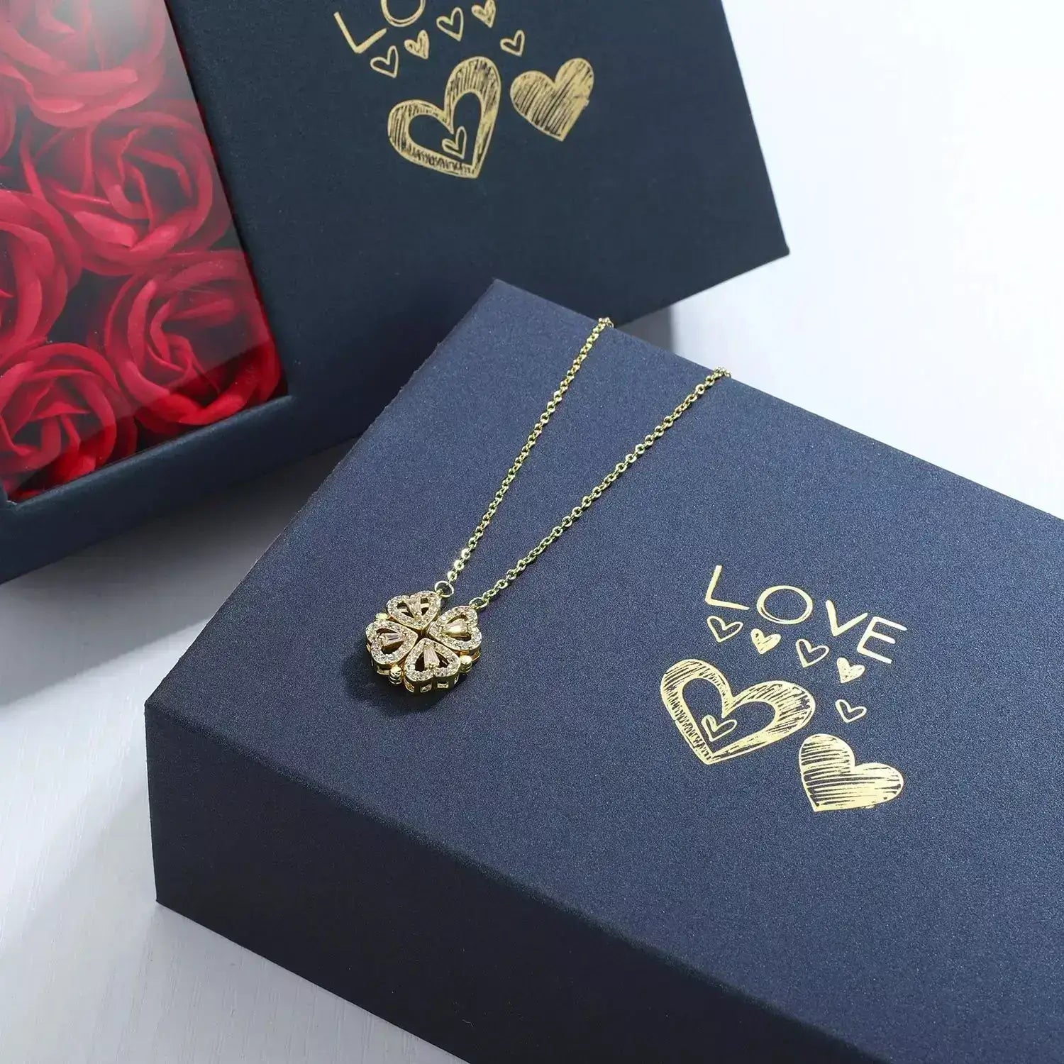 Magnetic Love Clover Necklace, Romantic necklace for couples, Couple’s magnetic necklace, Heart clover pendant necklace, Unisex romantic jewellery UK, Anniversary gift for her UK, Valentine’s Day gift UK, Meaningful gift for loved one, Symbolic love necklace, Gift box with roses necklace, Magnetic couple necklace UK, Love pendant necklace, Special occasion necklace, Romantic jewellery gift, Unique necklace for girlfriend, Eternal love necklace, Lucky clover necklace, Magnetic heart necklace