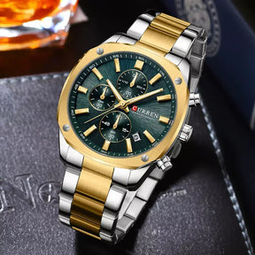 Veltrix gold and silver chronograph watch with green dial displayed on wrist