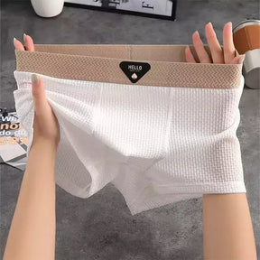 White FlexCool boxer briefs with lightweight breathable mesh fabric