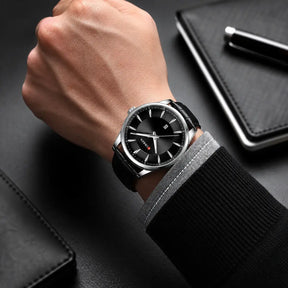 Montclair men’s watch with black leather strap worn on the wrist