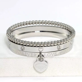 Love Heart Bracelet Set for women, stackable love heart bracelet, stainless steel heart bracelet gift, elegant jewellery for girlfriend, birthday gift bracelet for her, romantic love bracelet set, everyday women’s bracelet, Valentine’s gift jewellery for girlfriend, high-quality love heart bracelet, fashion bracelet for women UK, heart jewellery set for women, jewellery gift for her special occasion, premium love heart bracelet set