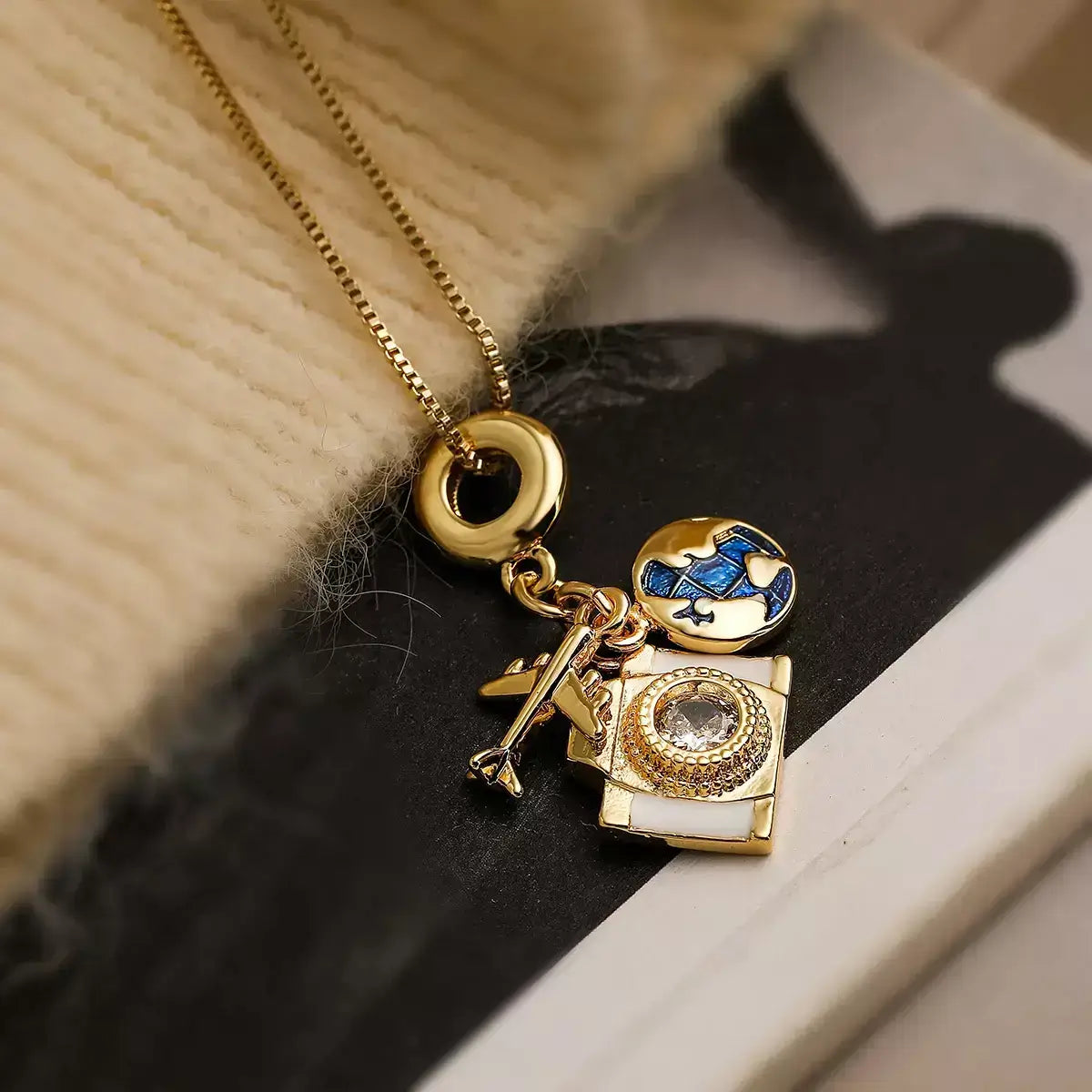 women’s necklace, travel necklace, adventure necklace, map and airplane necklace, elegant jewellery, sophisticated accessory, modern necklace, gift for her, explorer necklace, copper necklace, meaningful necklace, gift for traveller
