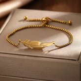 women’s elegant bracelete,

water-resistant women’s bracelet,

stylish women’s bracelete,

stainless steel women’s bracelet,

silver women’s bracelete,

rose gold bracelet women,

minimalist women’s bracelete,

feather charm bracelet,

fashion bracelet women,

adjustable bracelet for women