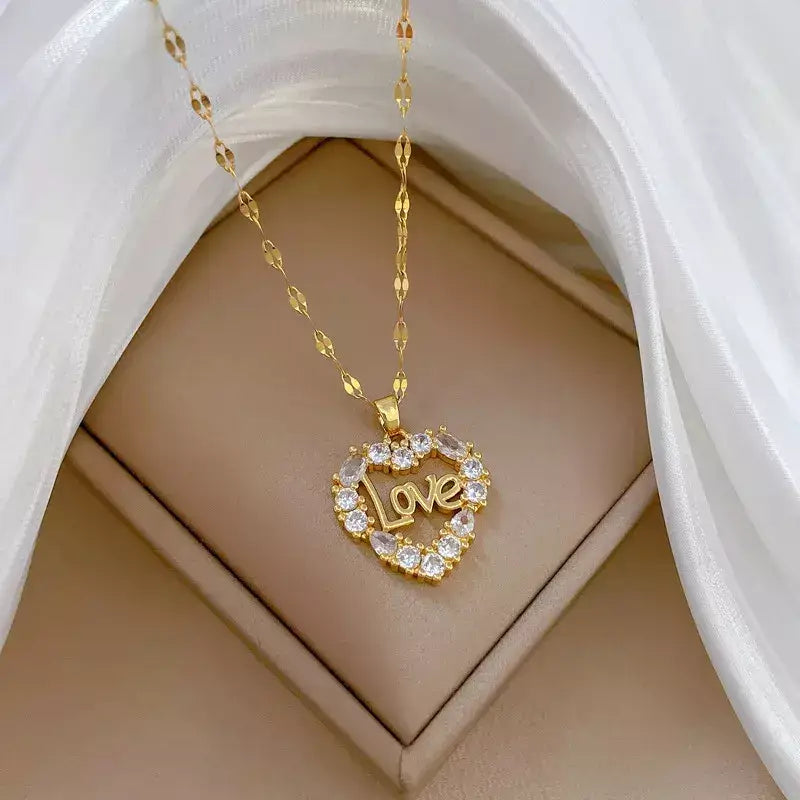 Love Women’s Necklace,love women’s necklace, gold women’s necklace, zircon heart pendant necklace, elegant necklace for her, romantic jewellery gift, stainless steel women’s necklace, timeless women’s jewellery, sparkling heart pendant necklace, delicate necklace for women, anniversary gift necklace, Valentine’s Day gift necklace, luxury women’s jewellery UK