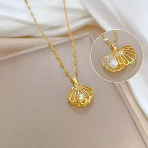 seashell pearl necklace, women’s seashell and pearl necklace, zirconia seashell necklace, elegant seashell necklace, modern pearl necklace, sophisticated women’s necklace, gift necklace for her, elegant beach style seashell necklace, women’s pearl jewellery, delicate seashell pendant necklace, luxury women’s necklace, pearl zirconia necklace gift, stainless steel women’s necklace, birthday gift necklace for women, necklace symbol of protection and love