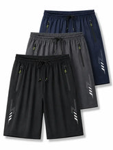 FlexDry men's quick-dry shorts in navy blue with drawstring waist and zip pockets