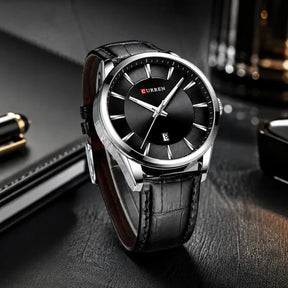 Montclair men’s black dial watch with leather strap in a premium setting